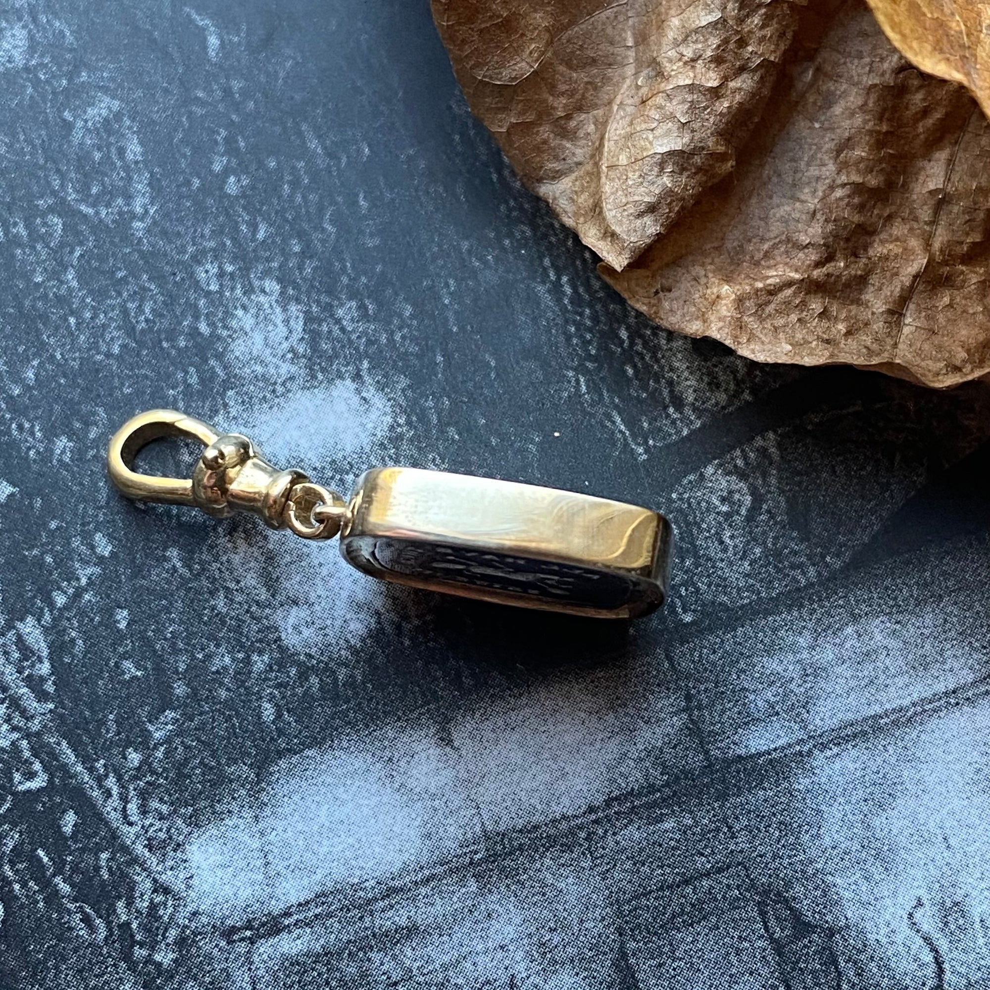 All Have Their Hobbies Witch Seal Pendant