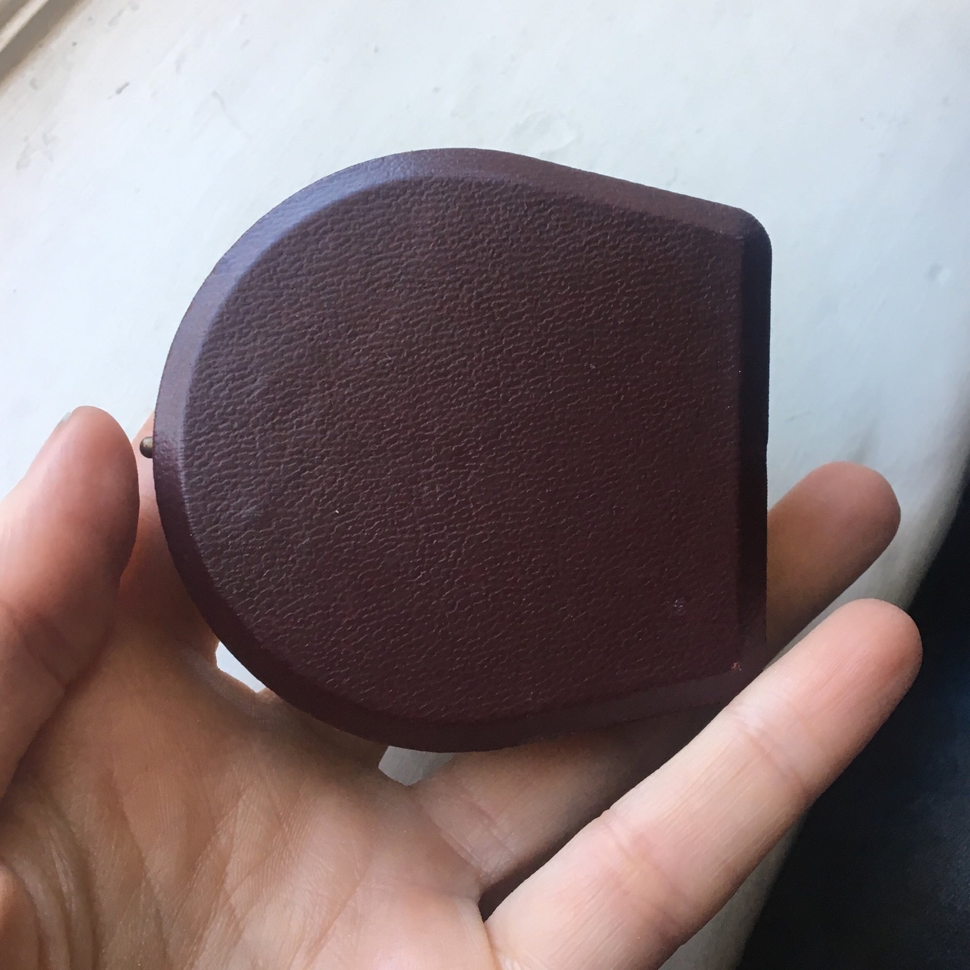 Domed leather boxes with gold trim detail