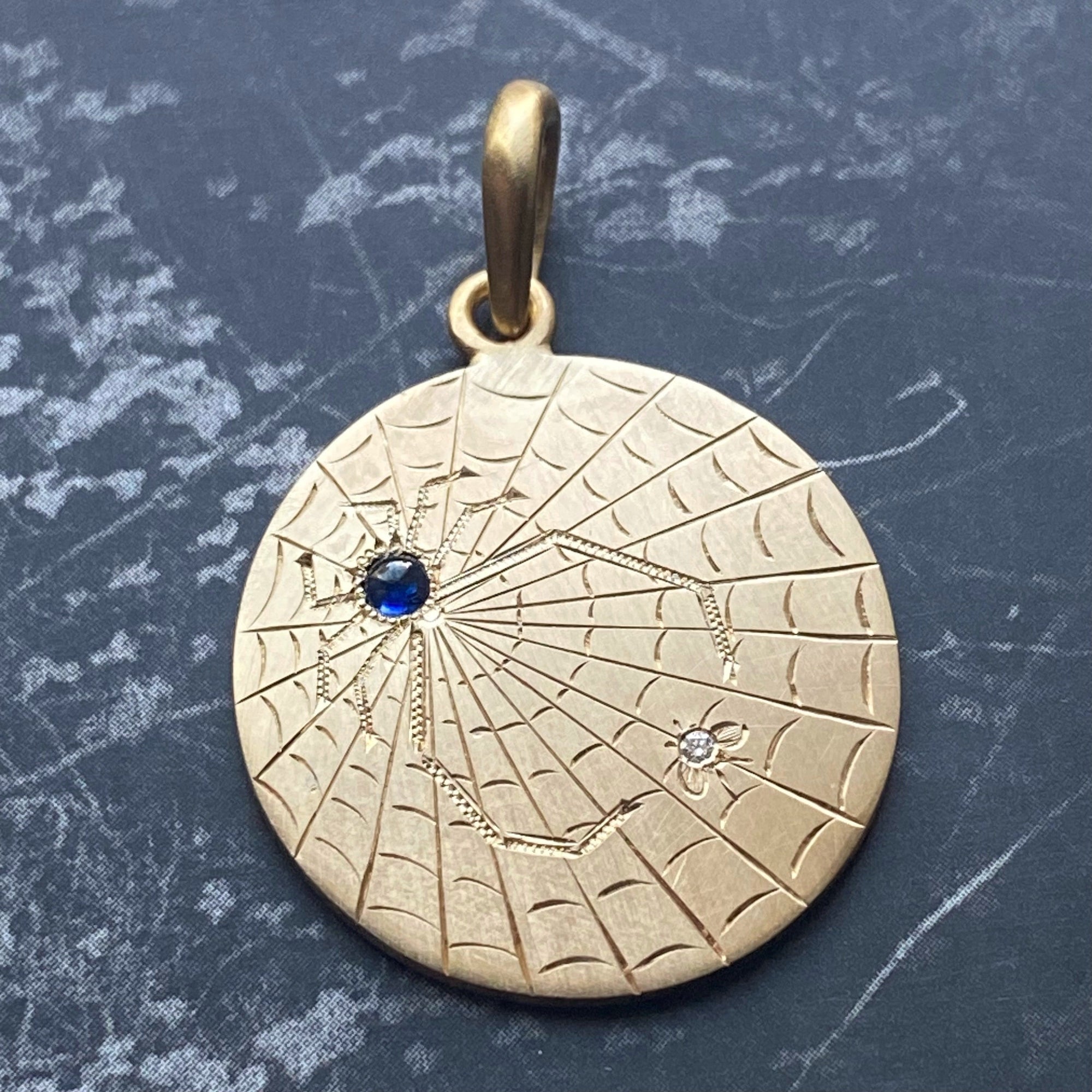 heavy gold charm