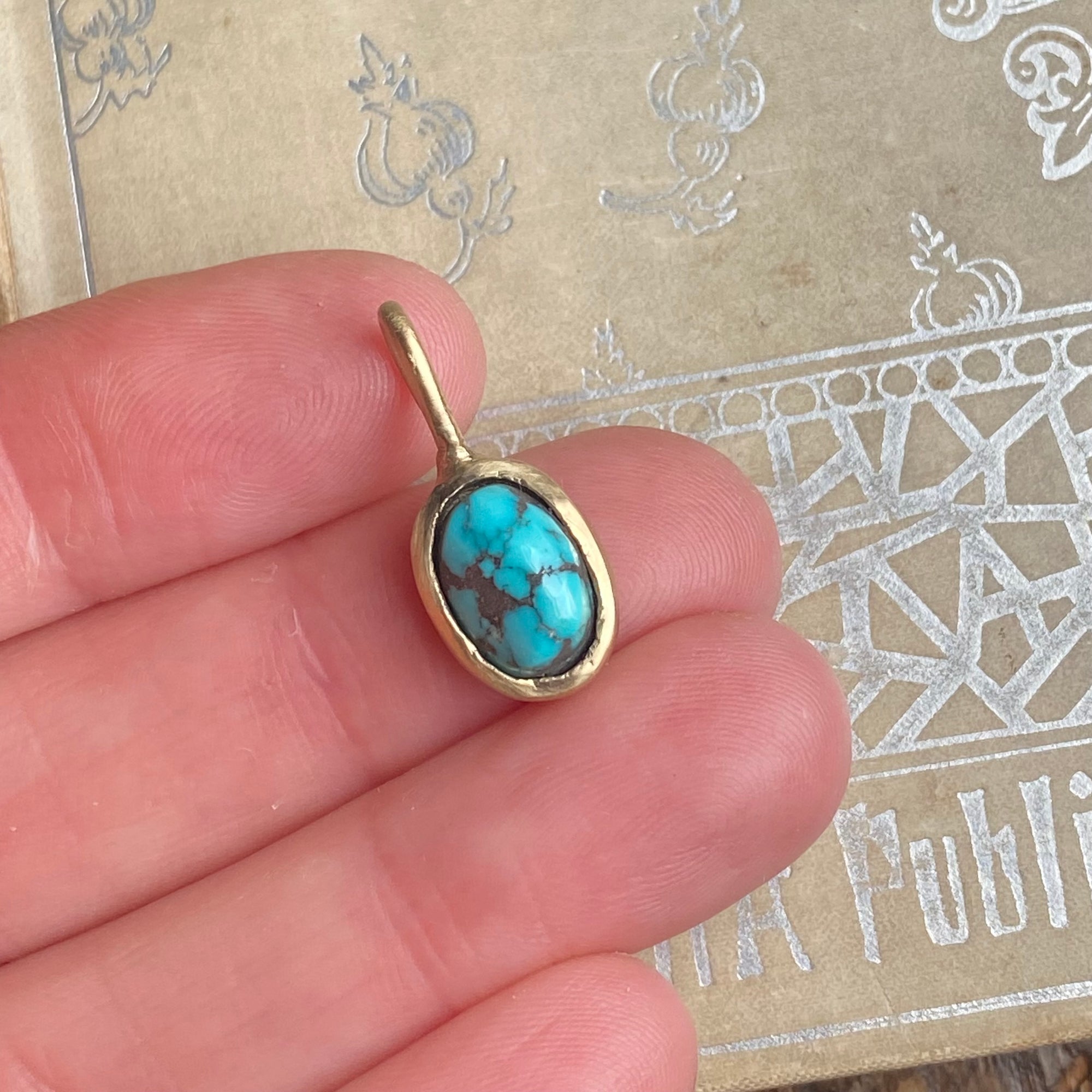 gold turquoise charm