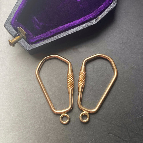 gold carabiner