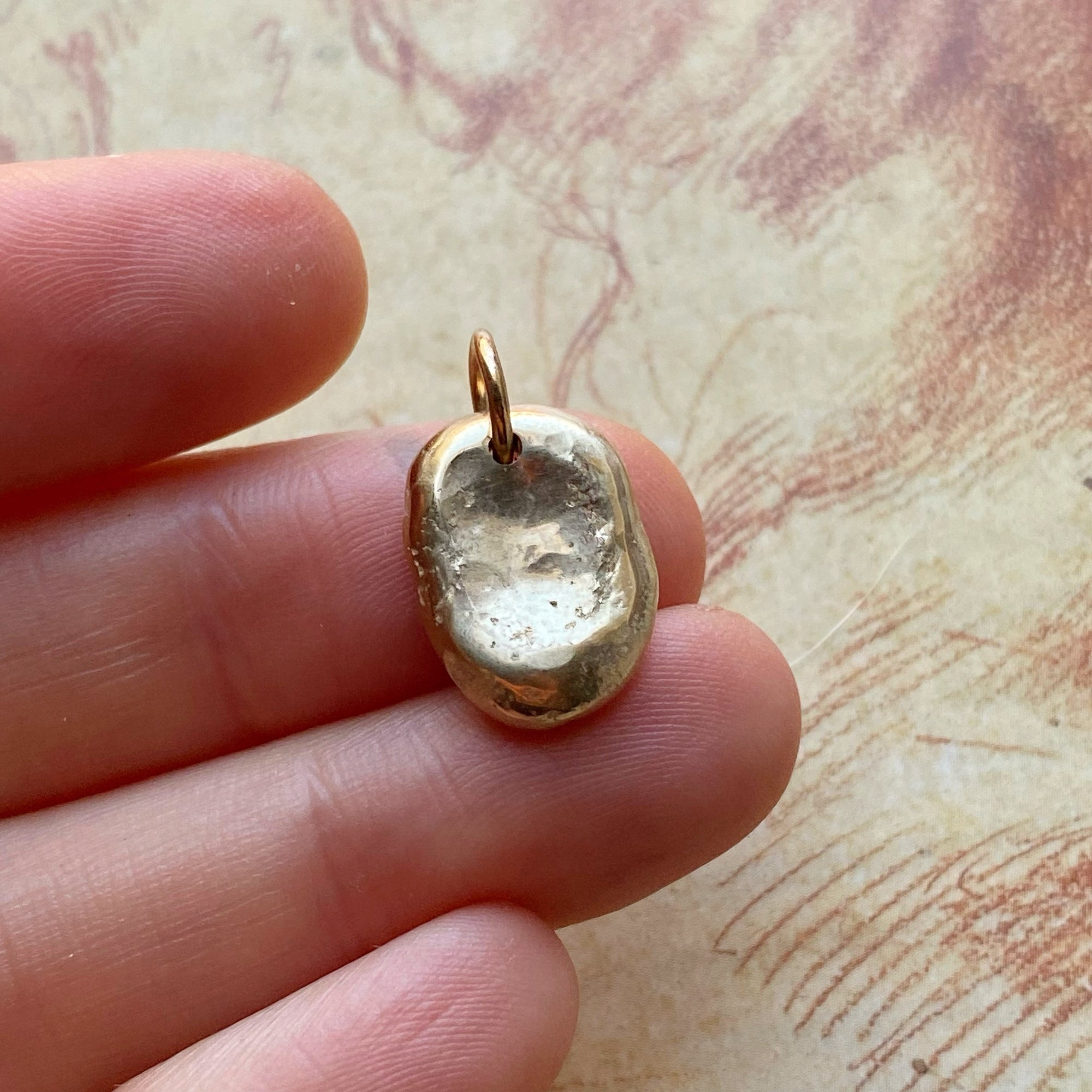 gold worry stone