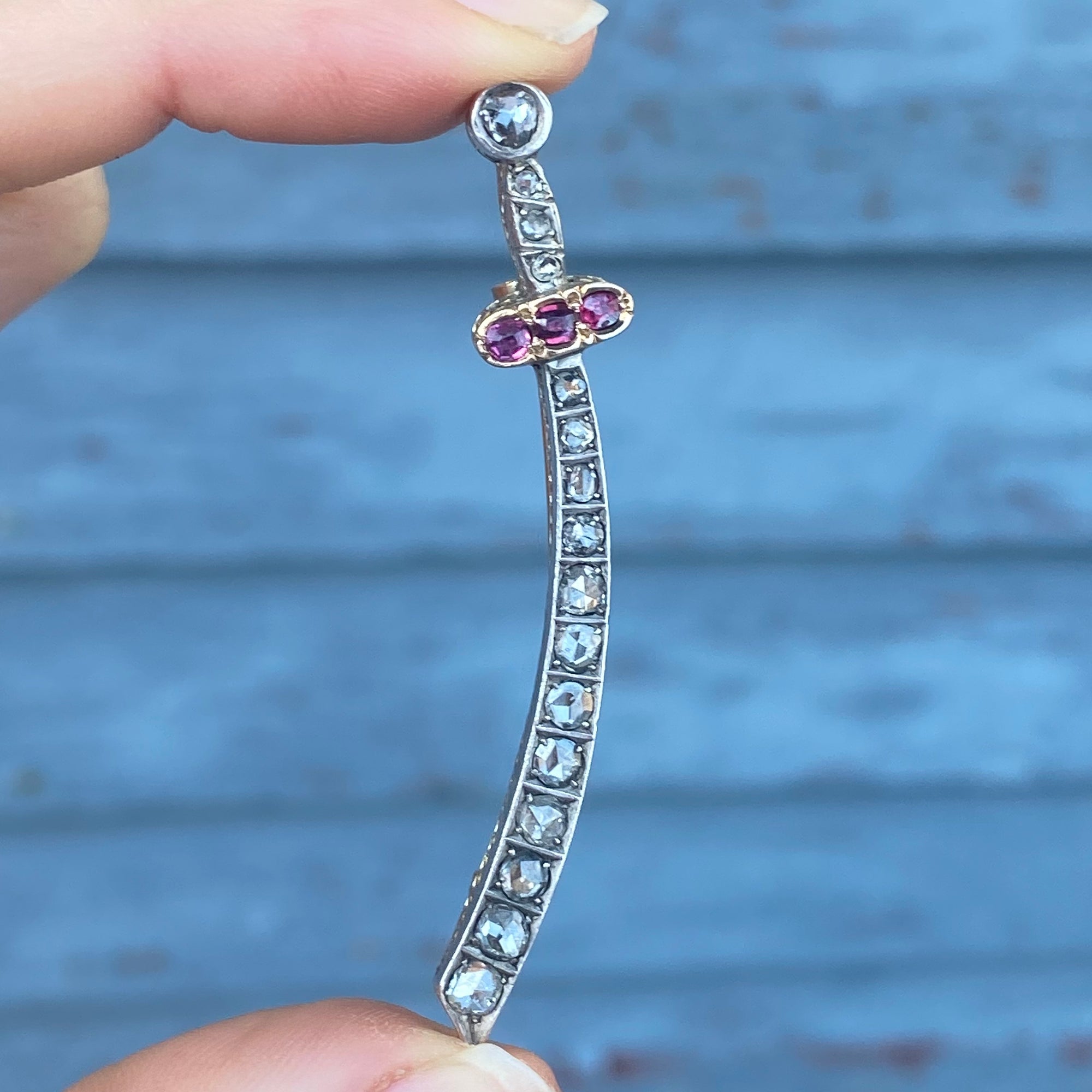 antique sword brooch